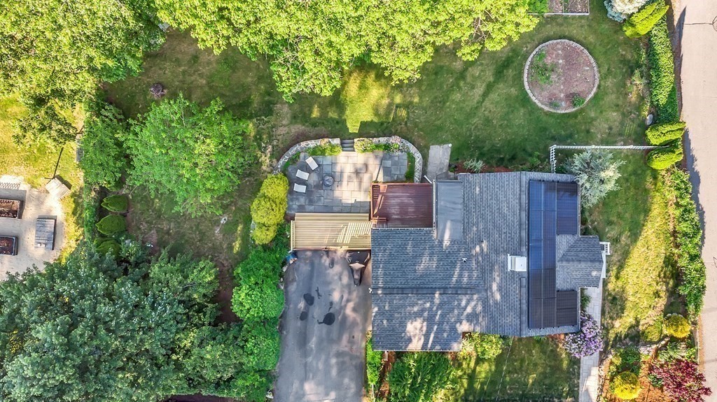 16 Fuller Road Billerica, MA 01821 - Photo 31 of 40 an aerial view of a house with garden space and trees all around