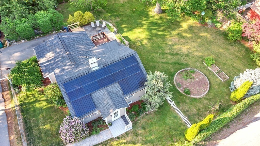 16 Fuller Road Billerica, MA 01821 - Photo 32 of 40 a view of a wooden house with a swimming pool and garden