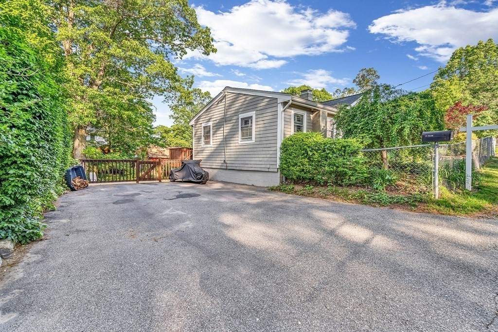 16 Fuller Road Billerica, MA 01821 - Photo 35 of 40 a view of a house with porch and garden