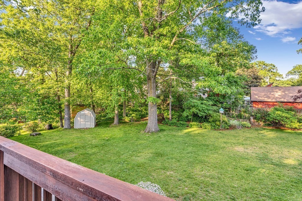 16 Fuller Road Billerica, MA 01821 - Photo 6 of 40 a view of a garden with a bench
