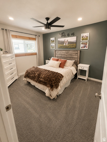 303 North Main Street Grace, ID 83241 - Photo 12 of 22 Bedroom featuring a dark accent wall, recessed lighting, and a ceiling fan with light