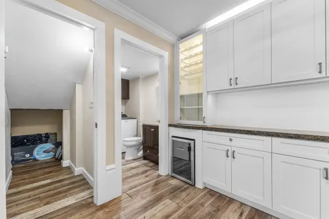 a view of a kitchen from the hallway