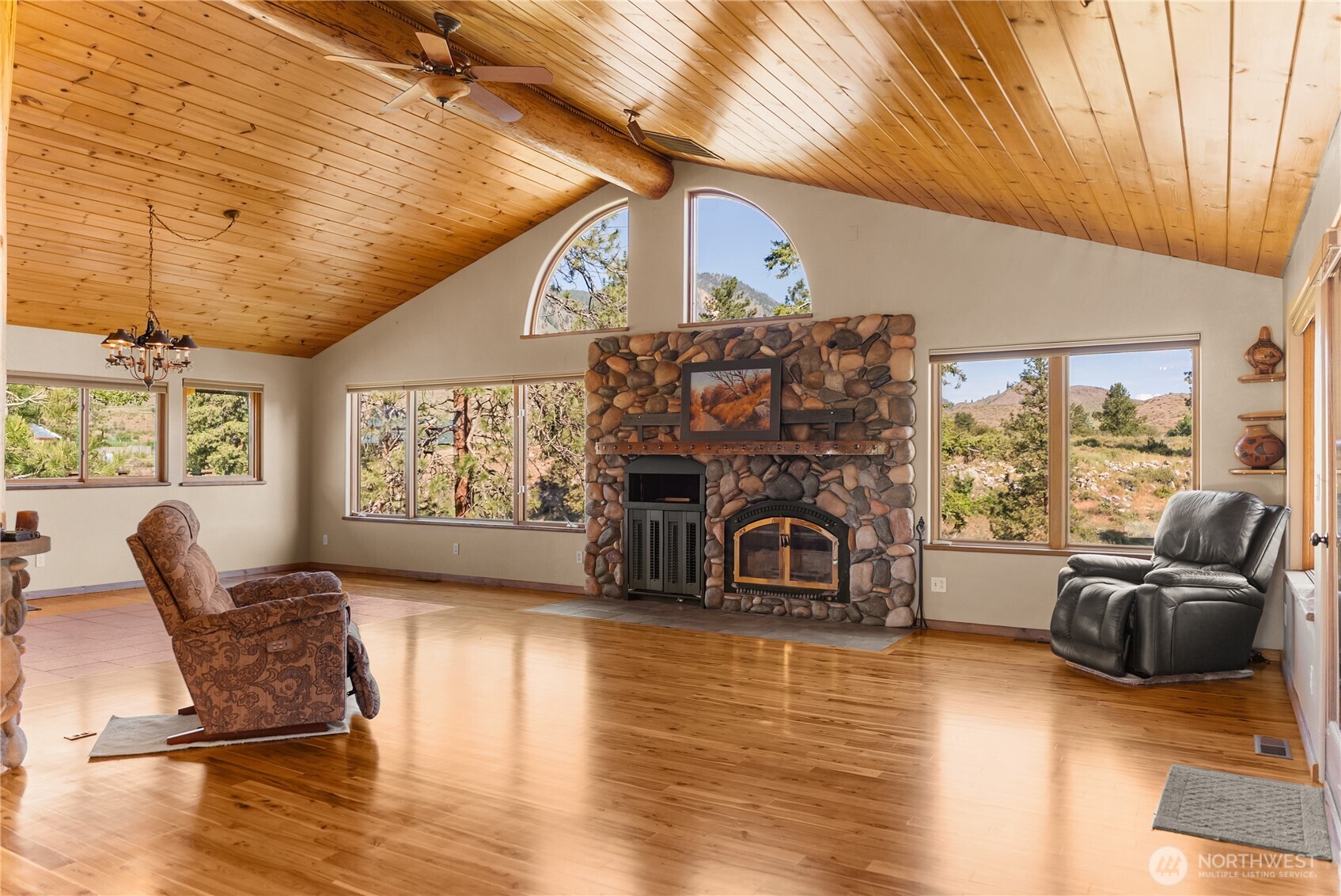 2621 Highway 153 Twisp, WA 98856 - Photo 26 of 40 a living room with furniture and a fireplace