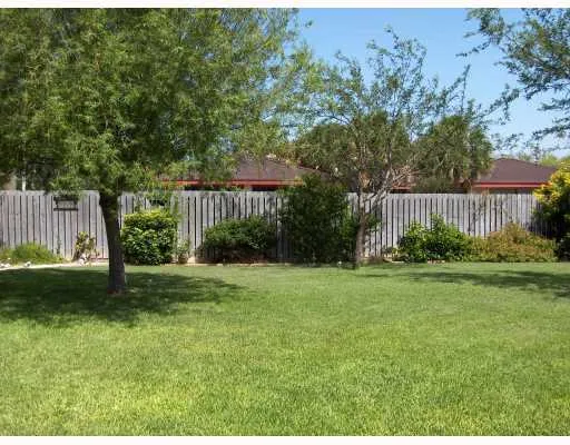 a view of a backyard with a garden