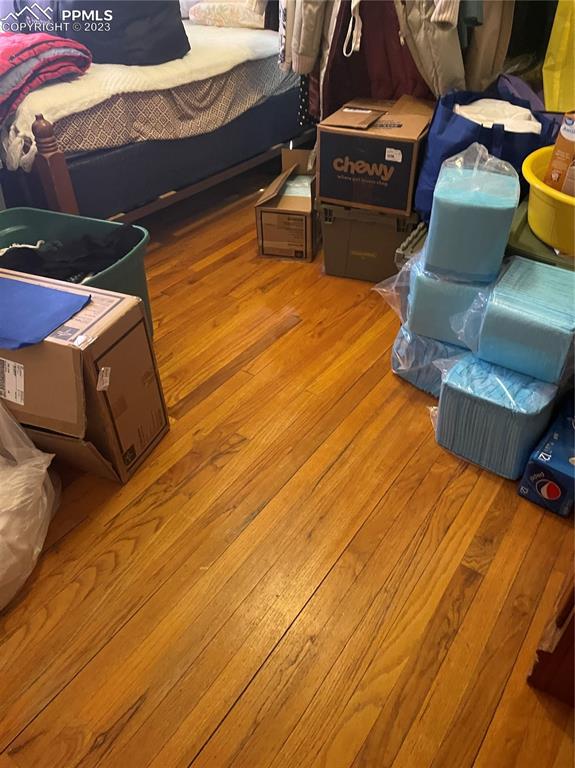 1128 East Routt Avenue Pueblo, CO 81004 - Photo 4 of 8 a view of a chairs and table on the wooden floor