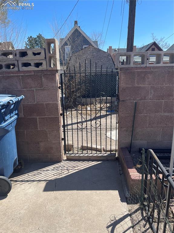 1128 East Routt Avenue Pueblo, CO 81004 - Photo 8 of 8 a view of a house with a small backyard