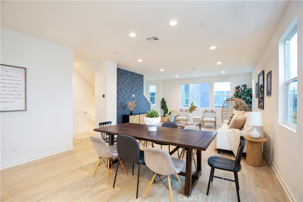 12232 Akira Drive Stanton, CA 90680 - Photo 11 of 39 a view of a dining room with furniture
