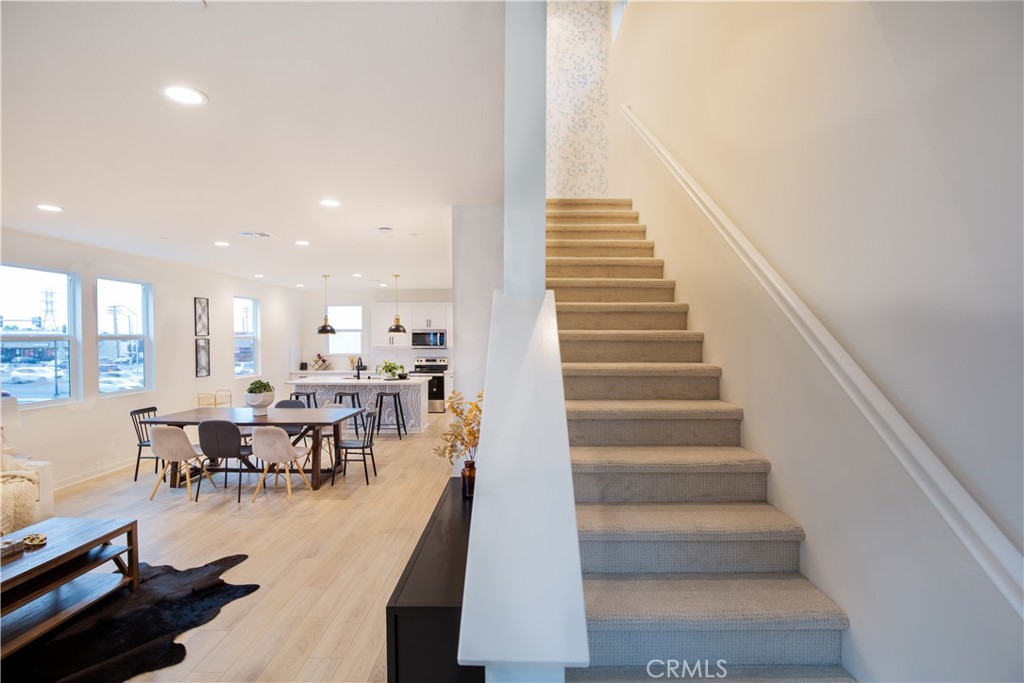 12232 Akira Drive Stanton, CA 90680 - Photo 13 of 39 a view of a dining room with furniture