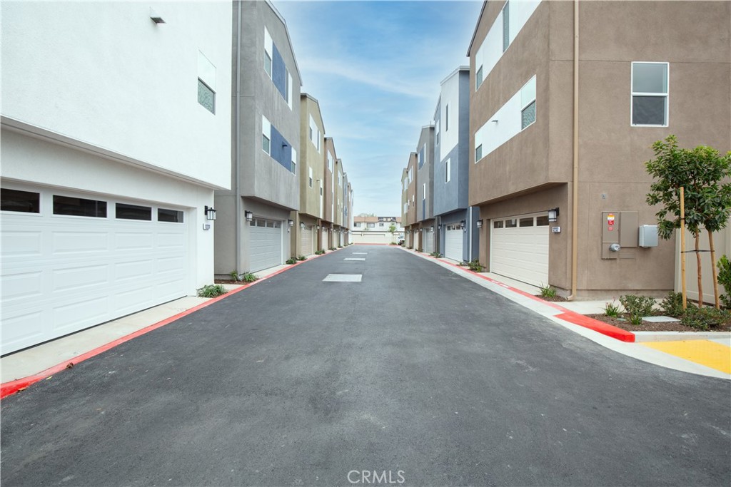 12232 Akira Drive Stanton, CA 90680 - Photo 31 of 39 a view of an house with street