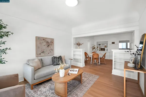a living room with furniture and a table