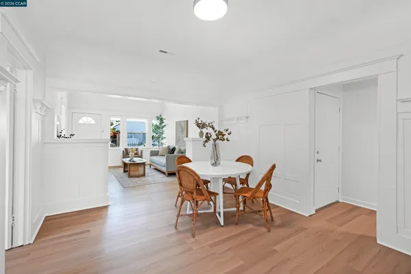 a view of room with wooden floor and closet