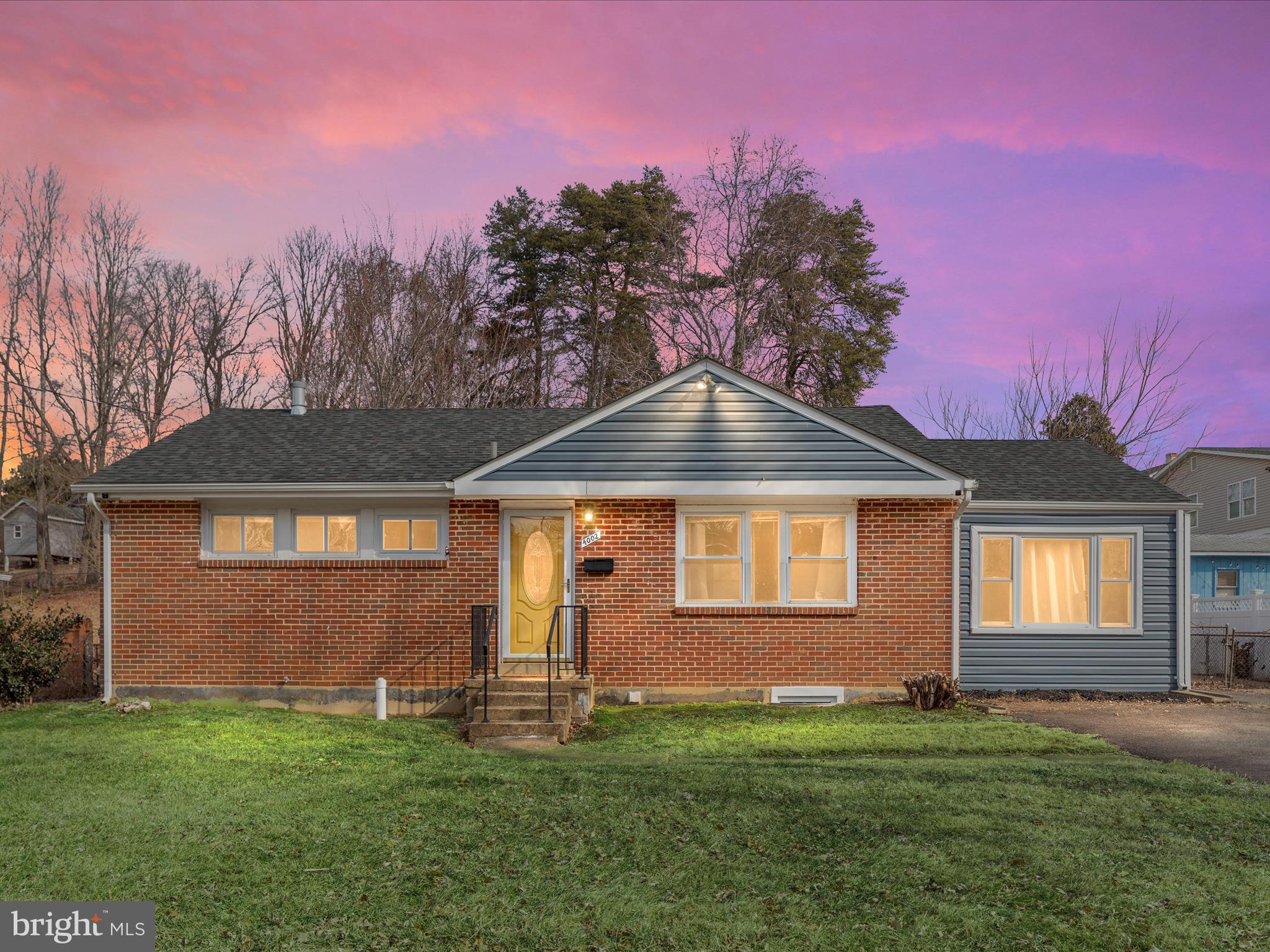 4002 Ronson Drive Alexandria, VA 22310 - Photo 1 of 30 a front view of a house with a yard