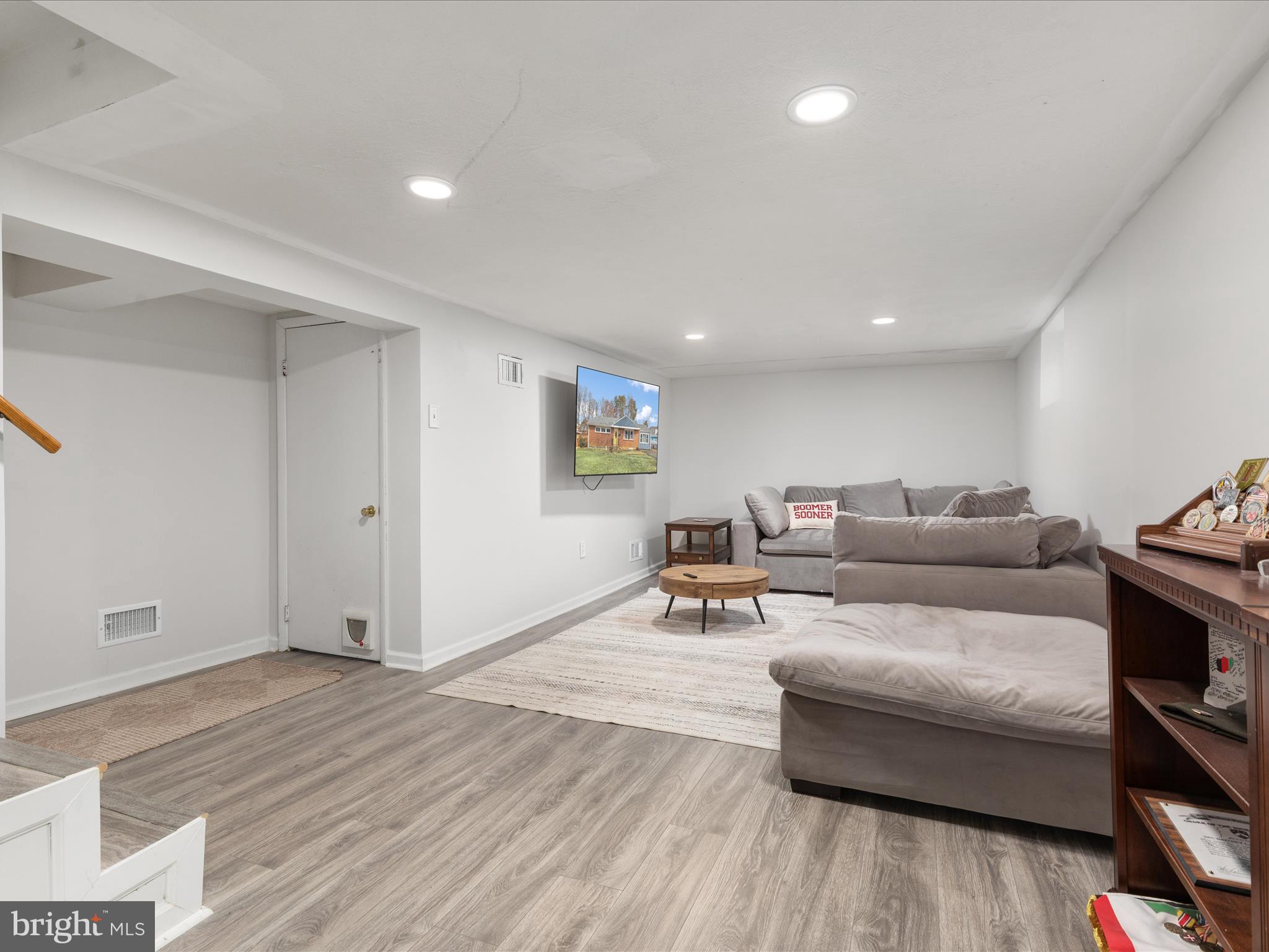 4002 Ronson Drive Alexandria, VA 22310 - Photo 17 of 30 a living room with furniture and a wooden floor