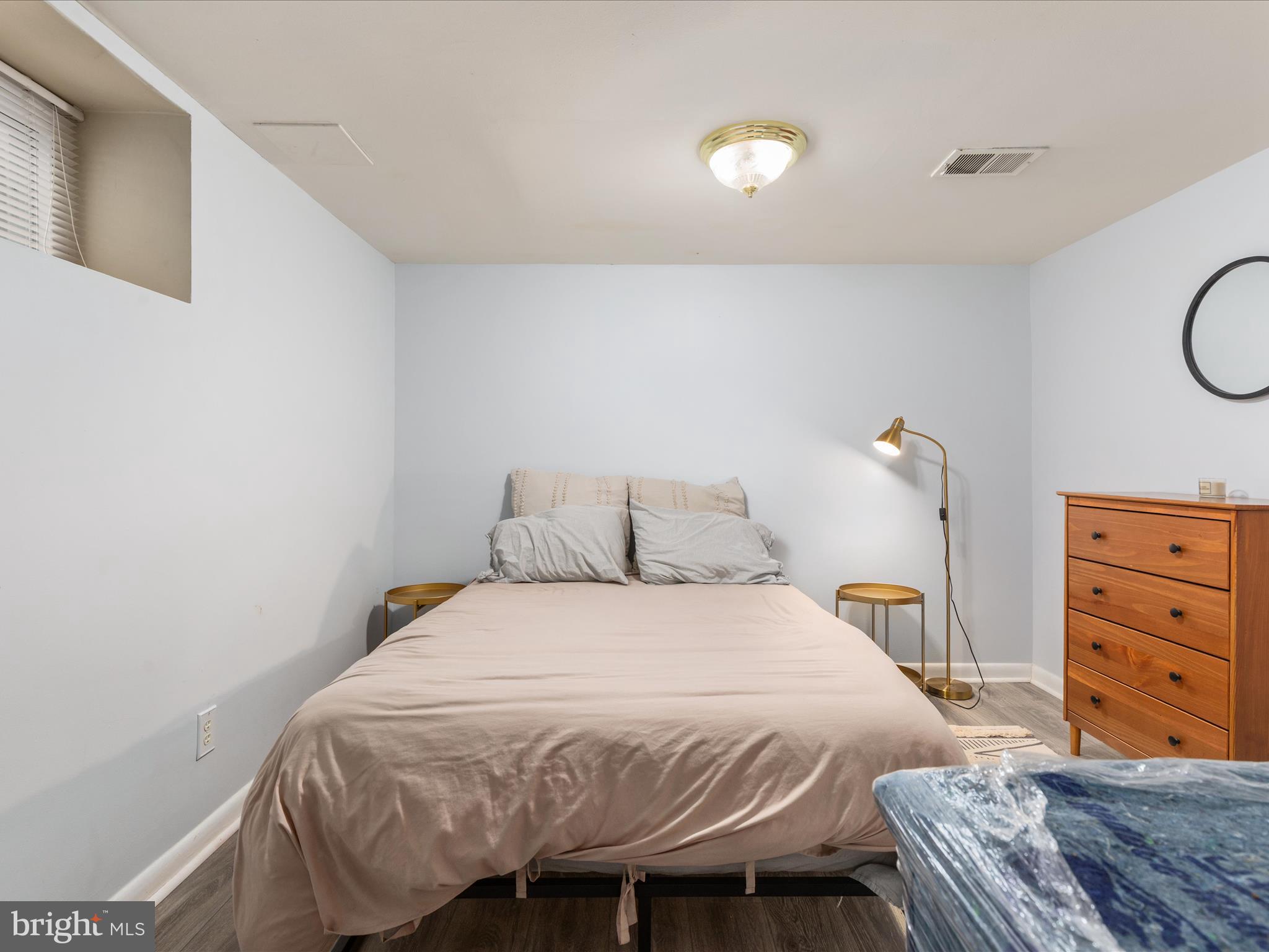 4002 Ronson Drive Alexandria, VA 22310 - Photo 20 of 30 a bedroom with a bed and a closet