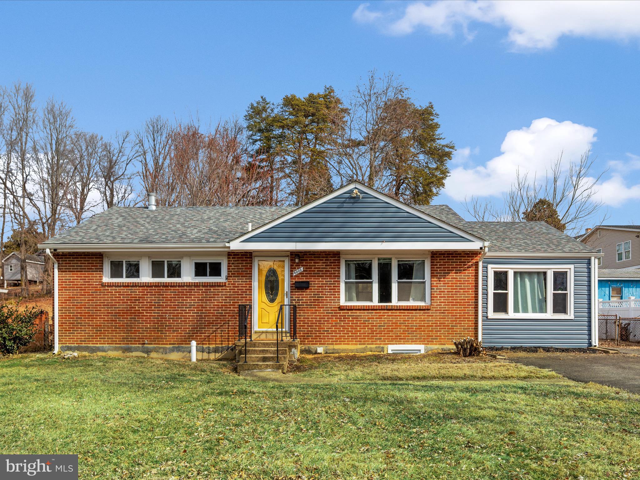 4002 Ronson Drive Alexandria, VA 22310 - Photo 2 of 30 a front view of a house with a yard