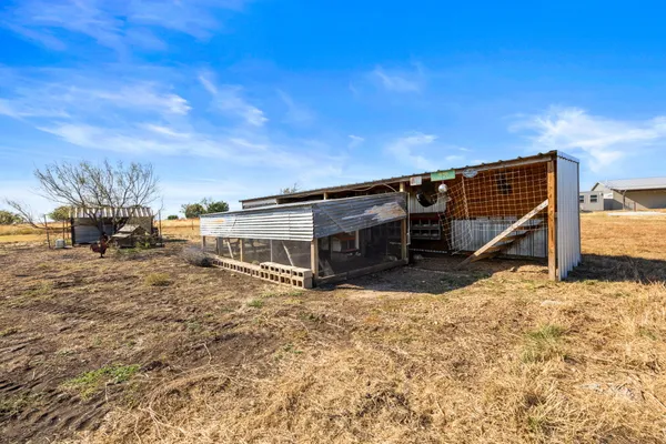 an aerial view of a house with a outdoor space