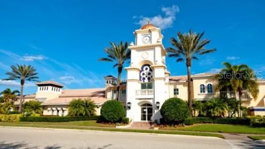 a tennis court view covered in trees