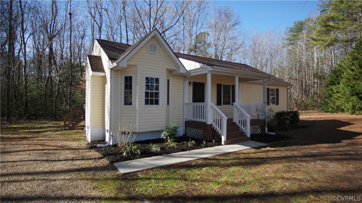 8111 Holdsworth Road Disputanta, VA 23842 - Photo 1 of 37 a front view of a house with a yard