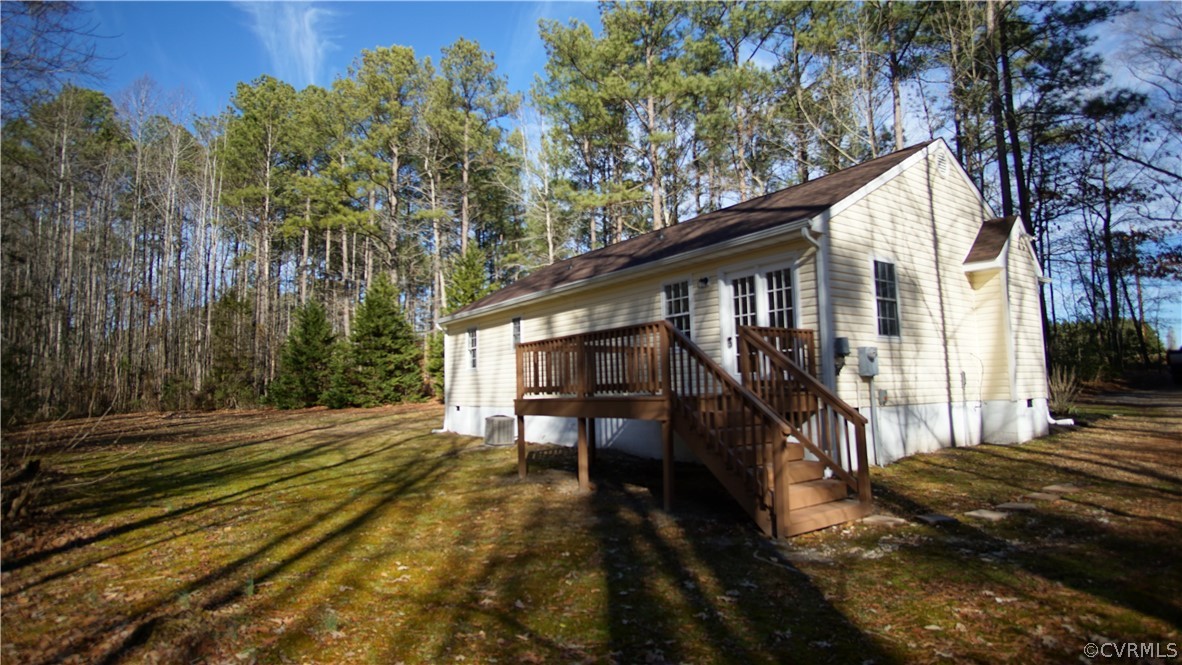 8111 Holdsworth Road Disputanta, VA 23842 - Photo 5 of 37 a view of house with backyard and sitting area