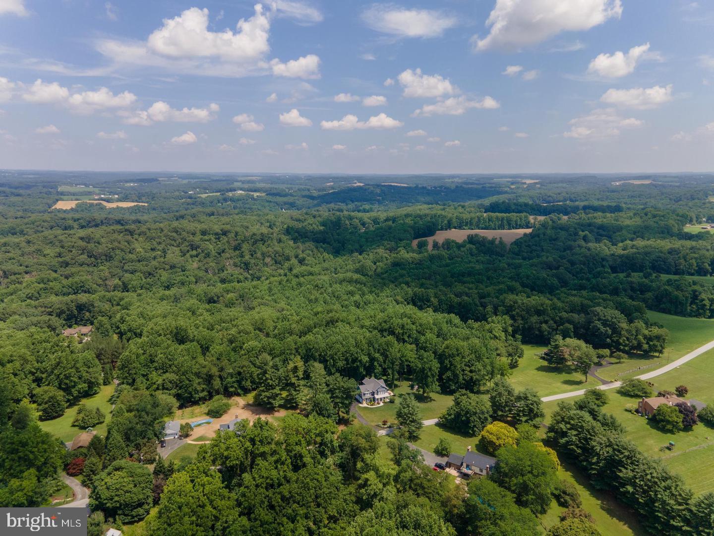 2016 Wilson White Hall, MD 21161 - Photo 3 of 3 a view of a city with lush green forest