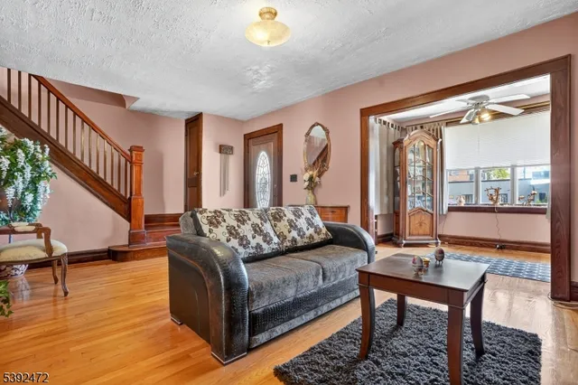 a living room with furniture and a table