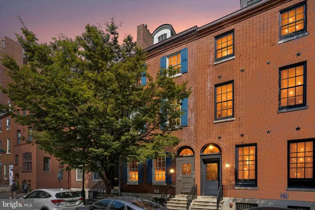 a front view of a building with street view