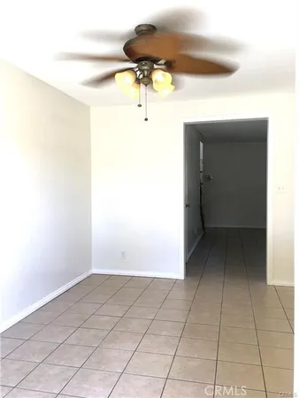 a kitchen with appliances cabinets and a window