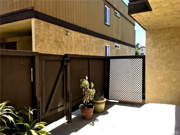 a view of gallery with wooden floor