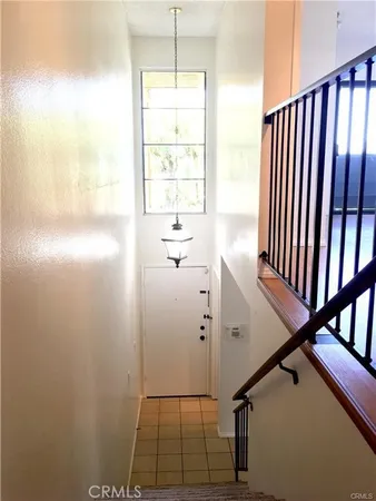 a bathroom with a sink mirror and vanity