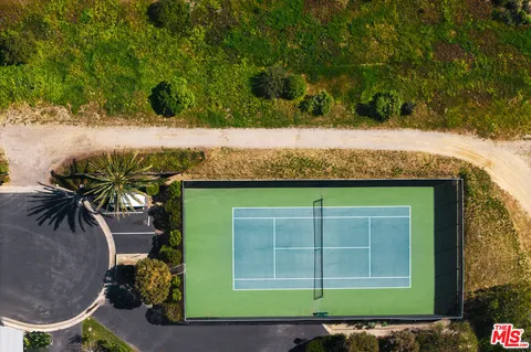 an aerial view of a house having yard