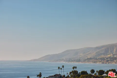 a view of mountain with sunset view