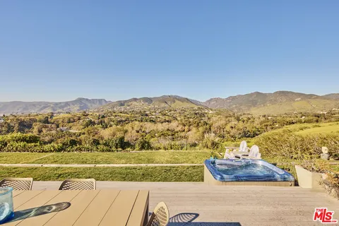 a view of lake with mountain