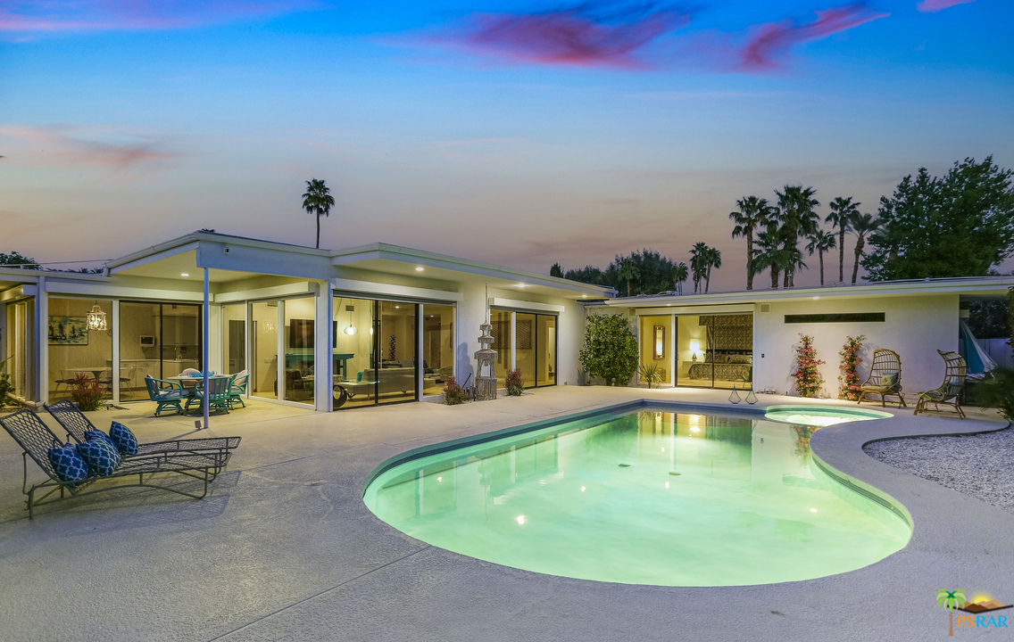 37255 Palm View Road Rancho Mirage, CA 92270 - Photo 5 of 8 a view of a house with swimming pool and sitting area