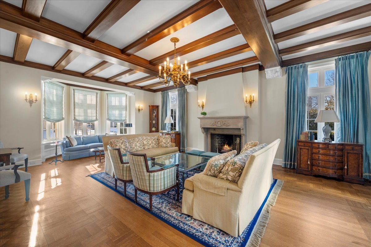 123 Oxford Road Kenilworth, IL 60043 - Photo 19 of 60 a living room with furniture and a fireplace