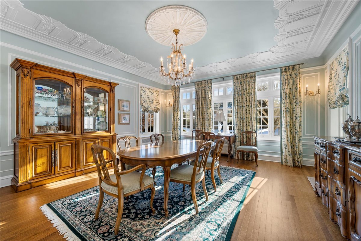 123 Oxford Road Kenilworth, IL 60043 - Photo 23 of 60 a view of a dining room with furniture window and wooden floor