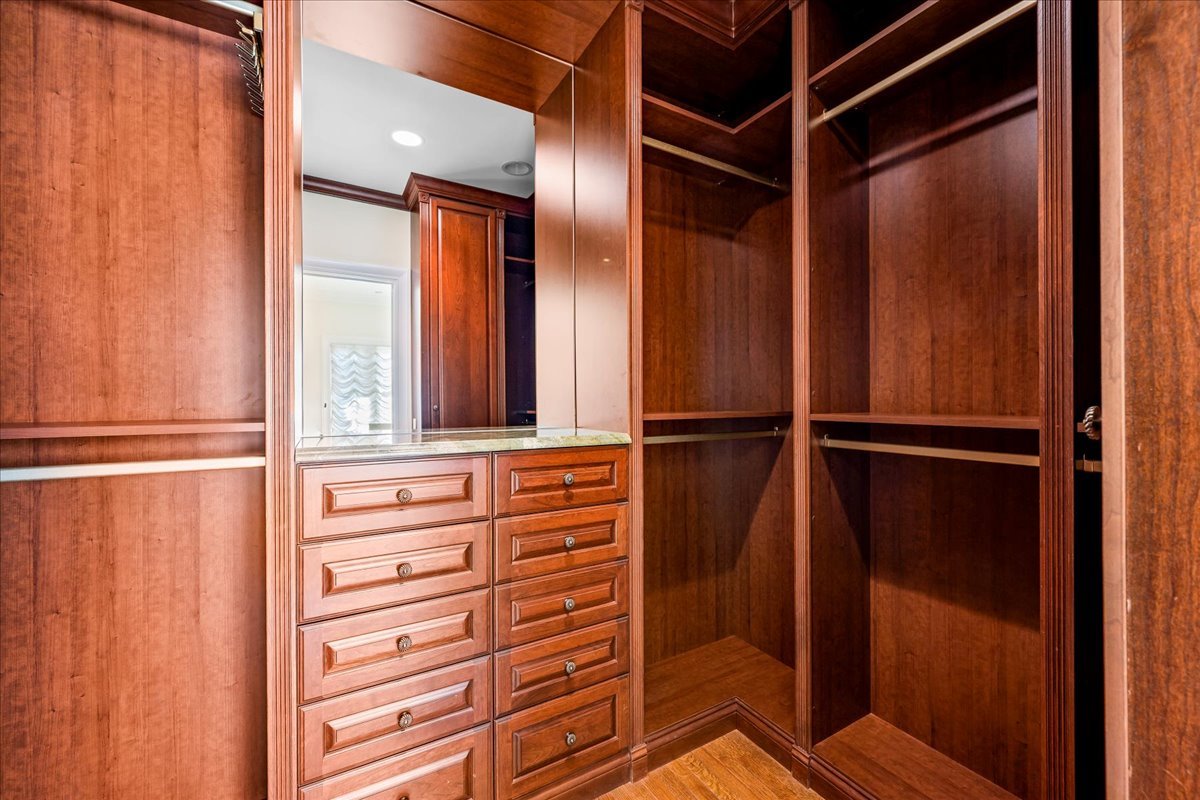 123 Oxford Road Kenilworth, IL 60043 - Photo 40 of 60 a view of walk in closet with empty racks