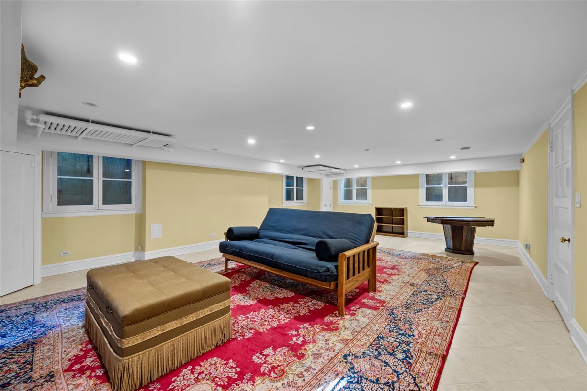 123 Oxford Road Kenilworth, IL 60043 - Photo 53 of 60 a living room with furniture and wooden floor