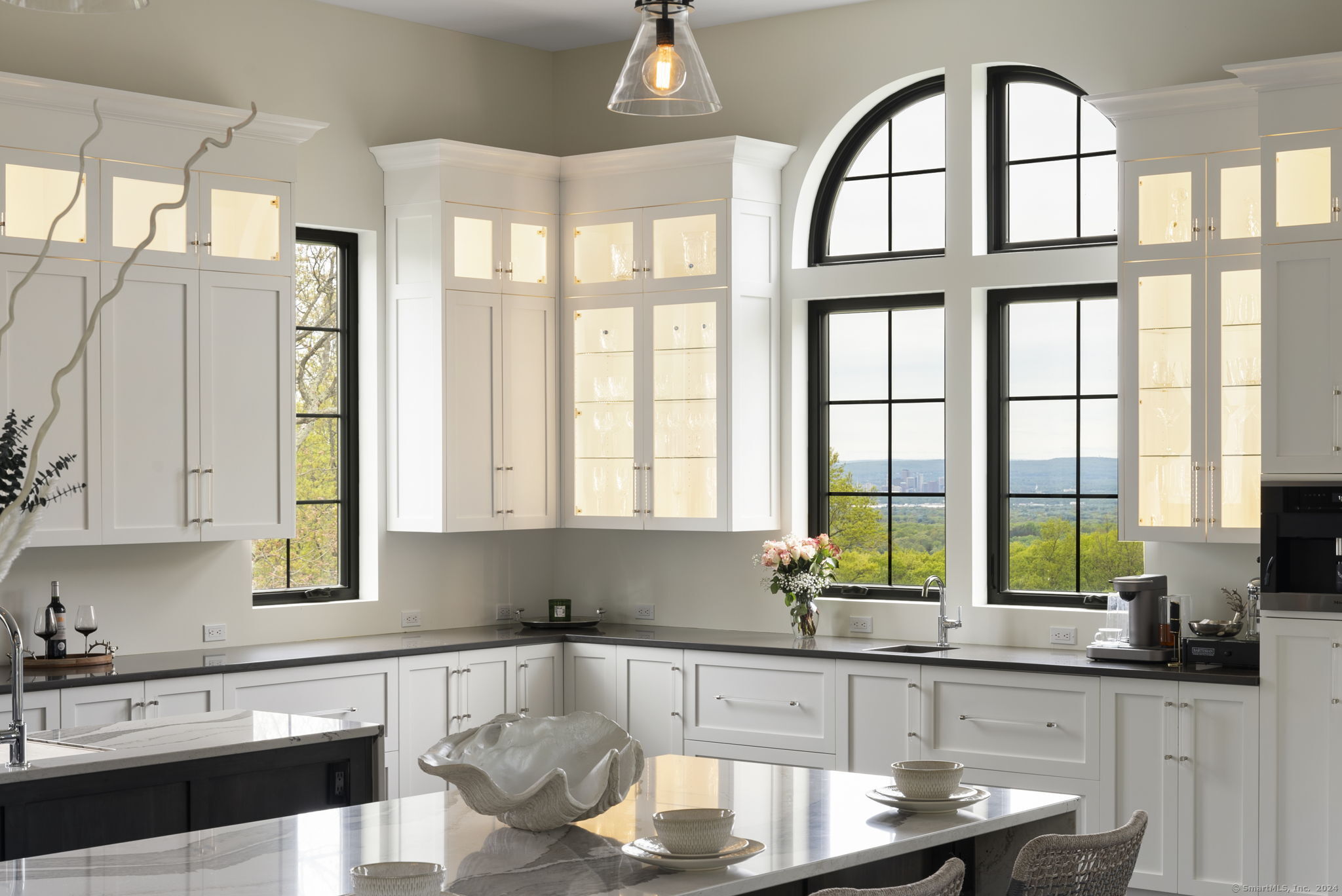 509 Cedar Ridge Drive Glastonbury, CT 06033 - Photo 12 of 40 a kitchen with stainless steel appliances granite countertop a stove a sink and a window