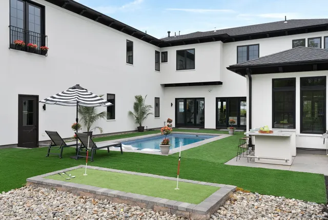 a view of a bench in a backyard