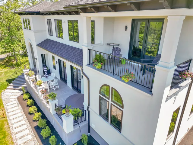a view of balcony with wooden floor