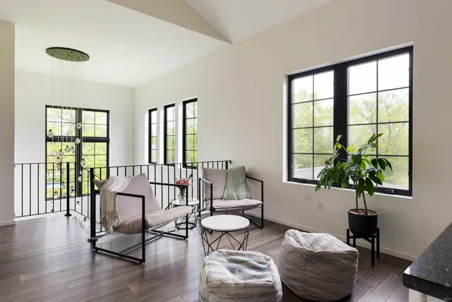 a view of balcony and wooden floor