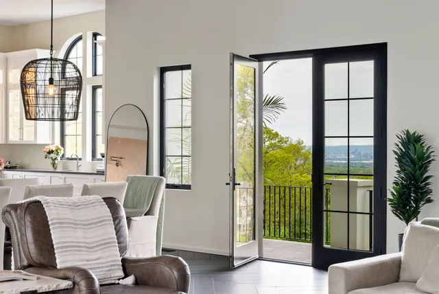 a patio with a patio table and chairs