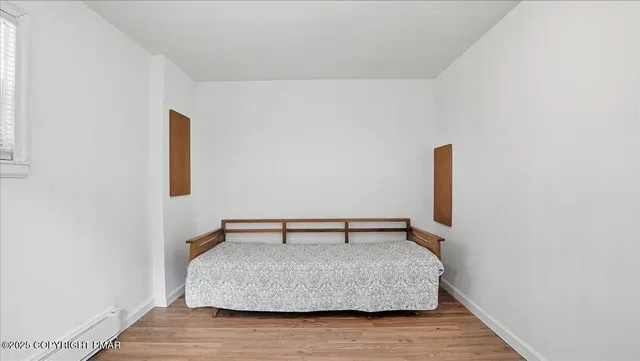 a close up of a bench sitting in a room