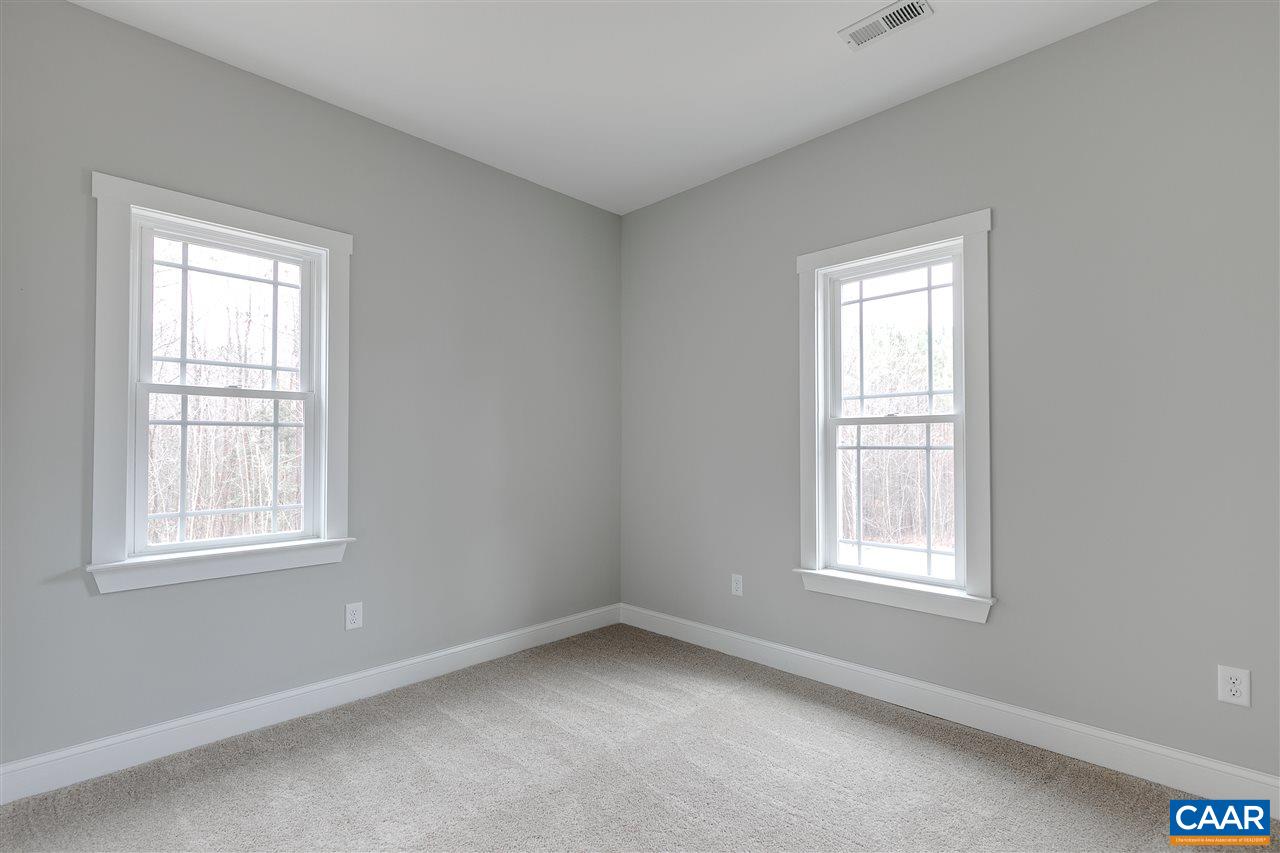 374 Winding Ridge Way Bumpass, VA 23024 - Photo 17 of 24 an empty room with a window