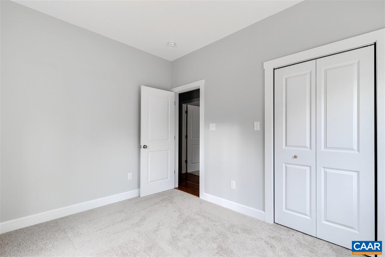 374 Winding Ridge Way Bumpass, VA 23024 - Photo 18 of 24 an empty room with closet area