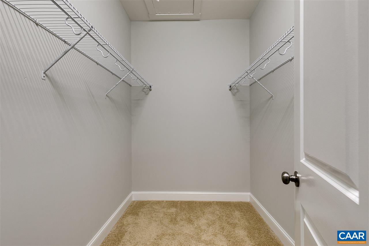 374 Winding Ridge Way Bumpass, VA 23024 - Photo 20 of 24 a view of small space with racks on the wall