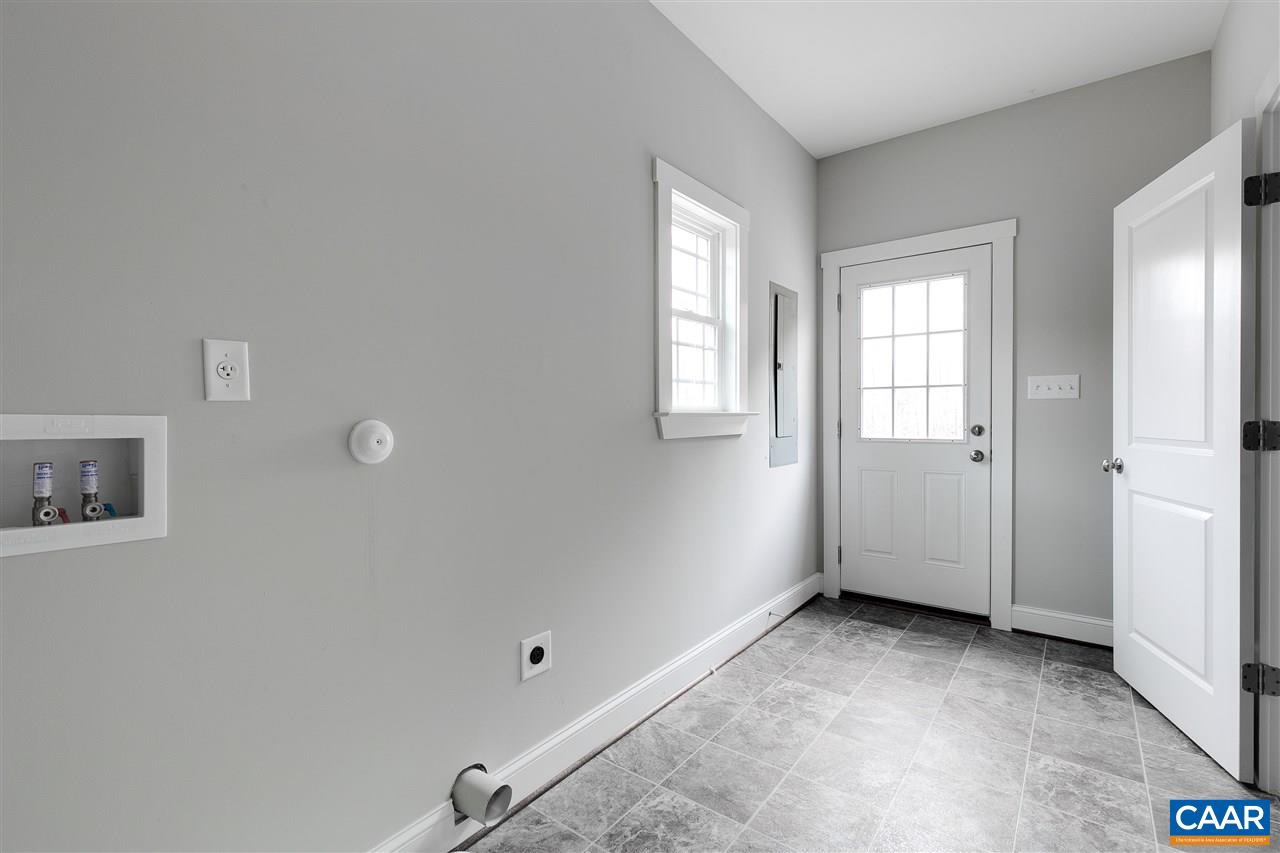 374 Winding Ridge Way Bumpass, VA 23024 - Photo 21 of 24 an empty room with windows
