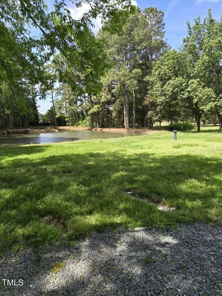 511 Providence Road Oxford, NC 27565 - Photo 14 of 56 Pond with bridge going out to midde