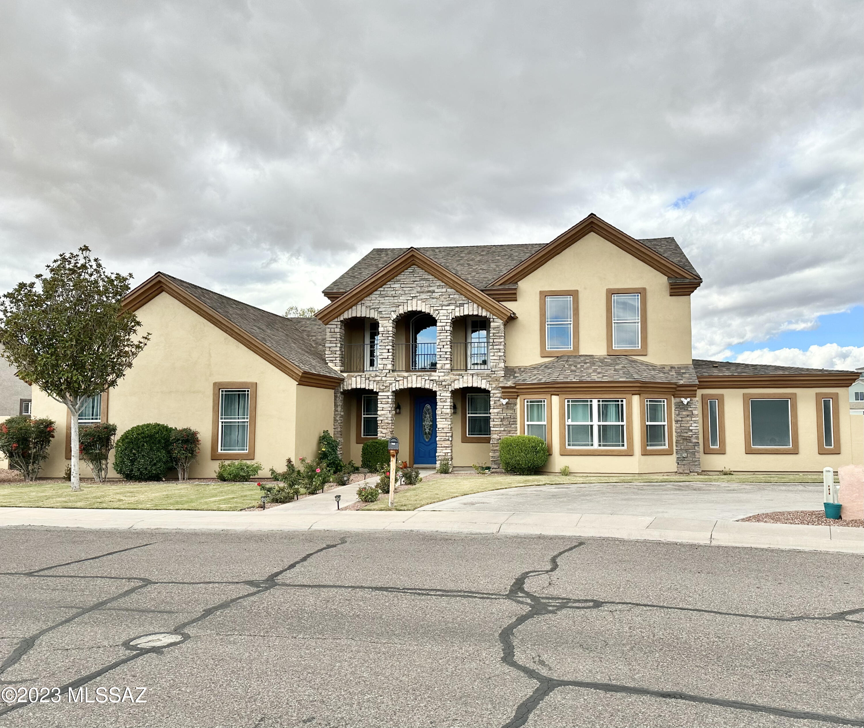 508 Eagle Meadow Loop Thatcher, AZ 85552 - Photo 1 of 32 a front view of a house with a garden