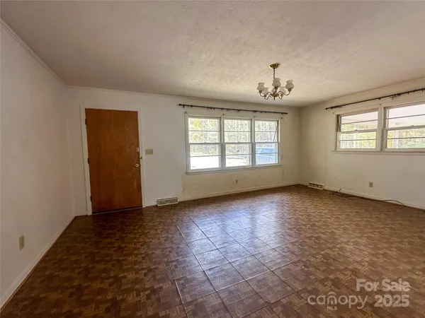 an empty room with windows